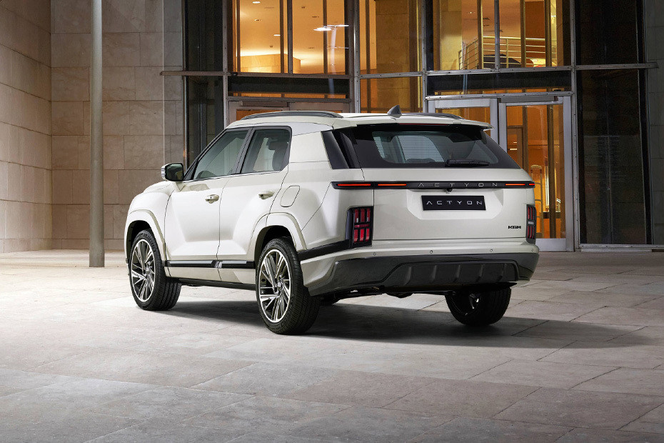 Rear Cross Side View of كي جي إم أكتيون Rear Cross Side View of كي جي إم أكتيون